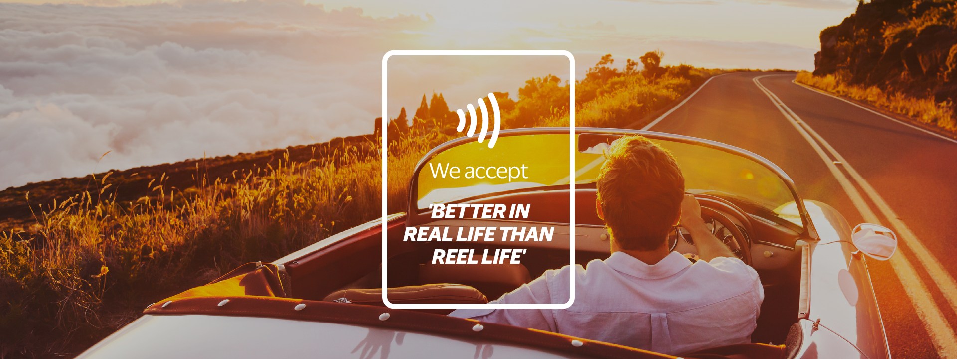 A man is driving at sunset. Better in real life than reel life